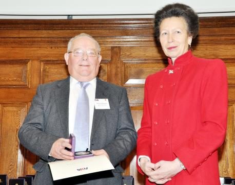 Dennis receives honour from Princess Anne
